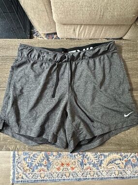 Nike Grey Athletic Shorts with White Swoosh